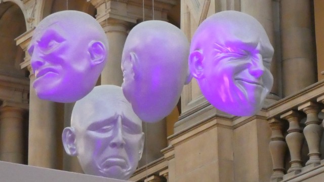 Photo of The Floating Heads installation at the Kelvingrove Museum in the Scottish city of Glasgow